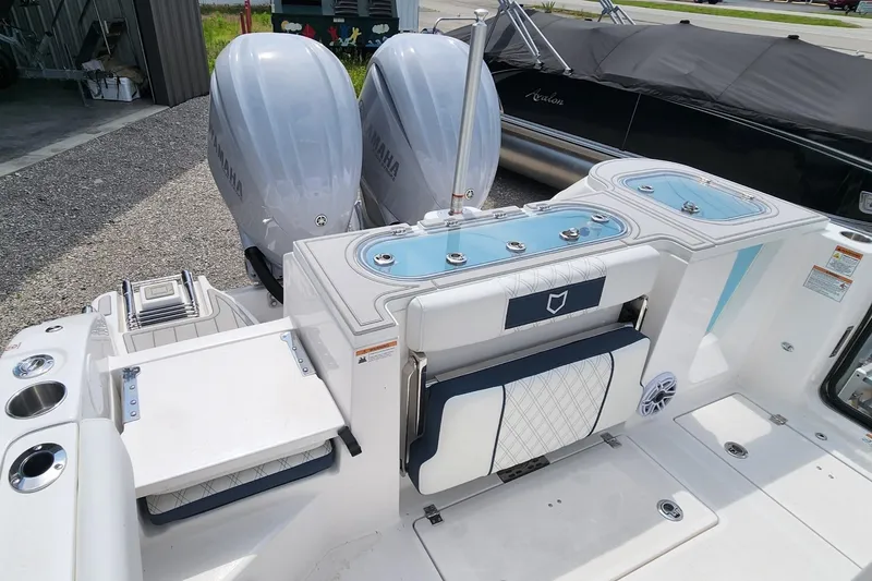 Slide: The Image of 2025 Sea Fox 288 Commander boat with dual engines and sleek deck design. - 13