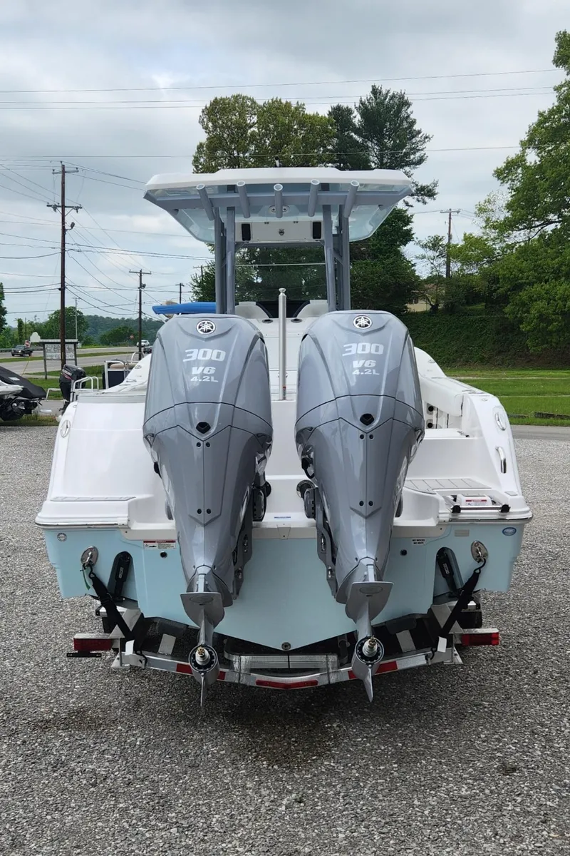 Slide: The Image of 2025 Sea Fox 288 Commander boat with dual 300 HP engines, rear view. - 5