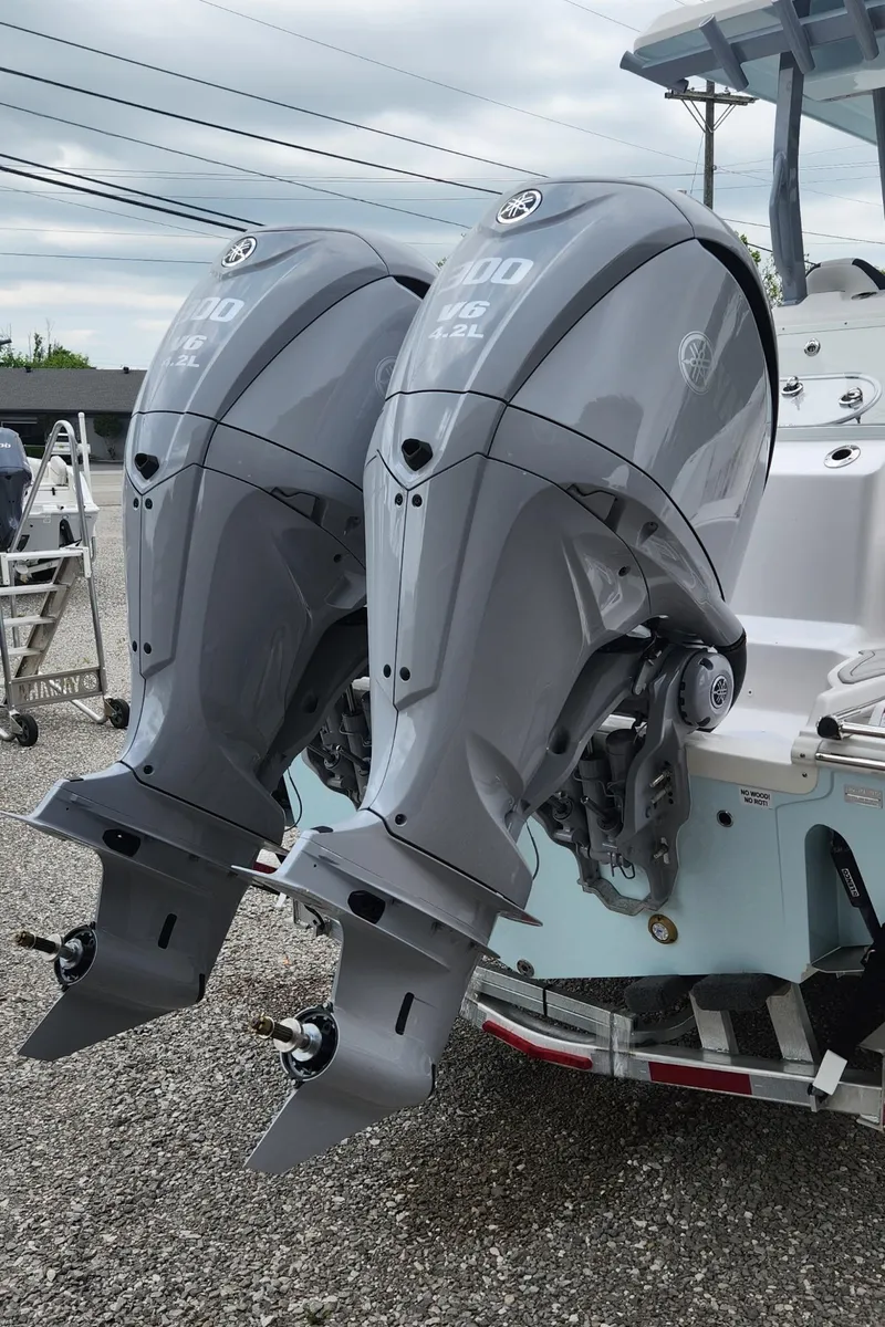 Slide: The Image of Twin outboard engines on a 2025 Sea Fox 288 Commander boat. - 6