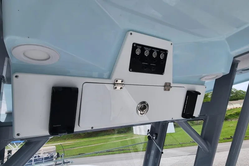 Slide: The Image of 2025 Sea Fox 288 Commander boat console with speakers and control panel. - 9