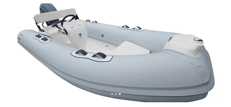 Slide: The Image of 2021 Apex A12 inflatable boat with steering console and outboard motor. - 17