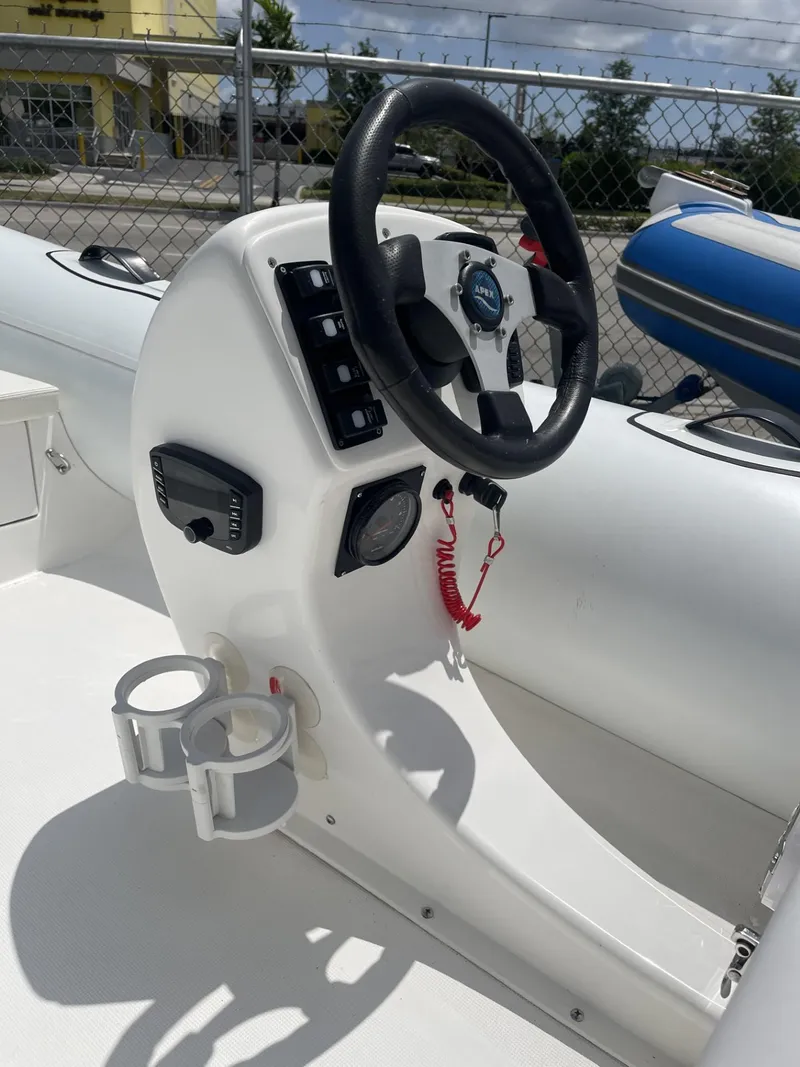 Slide: The Image of Apex A12 boat console with steering wheel and controls, 2021 model. - 9