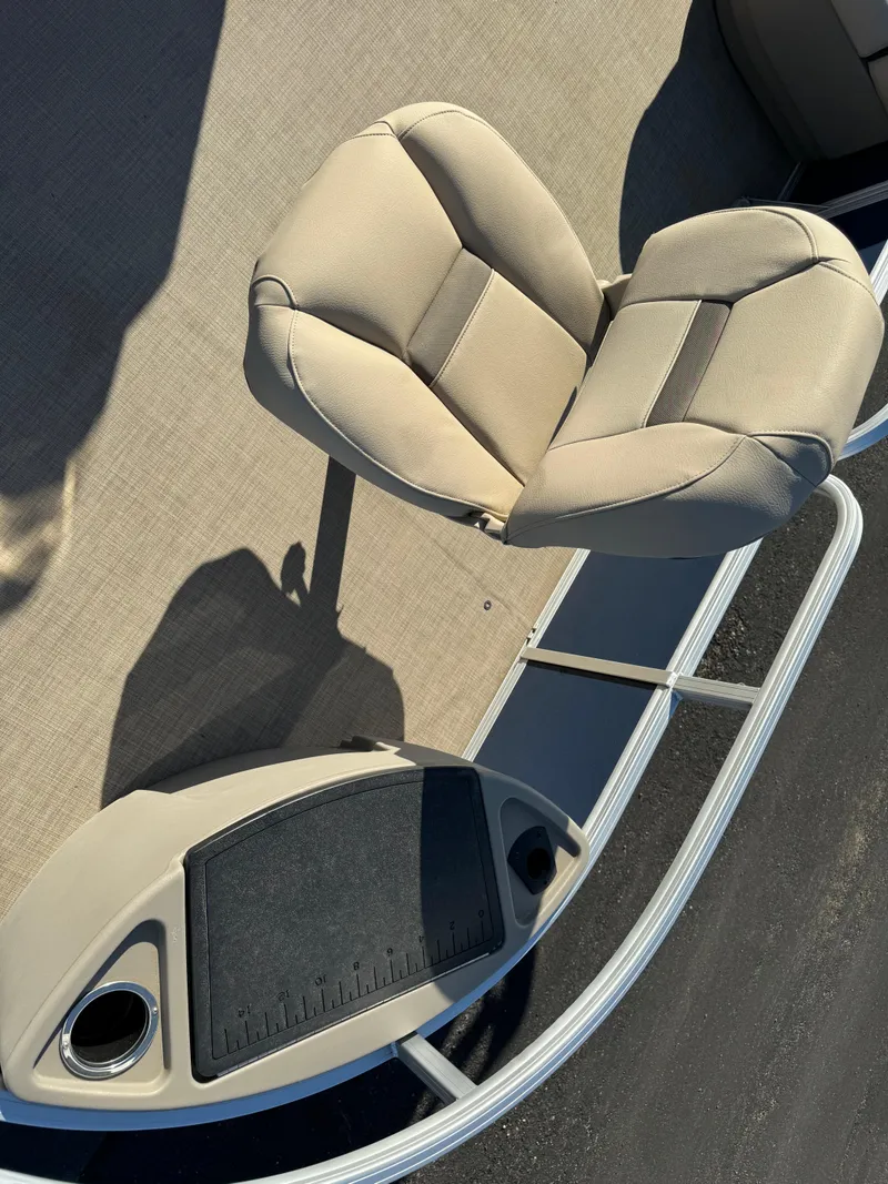Slide: The Image of 2023 Sun Tracker Bass Buggy 18 DLX boat seat and console with cup holders. - 7