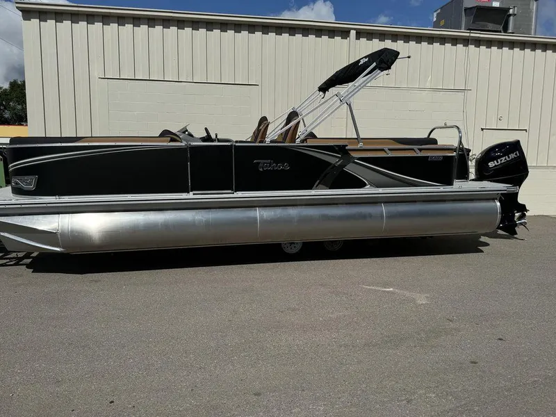 Slide: The Image of 2025 Tahoe LTZ 2585 QL pontoon boat with Suzuki outboard motor. - 0