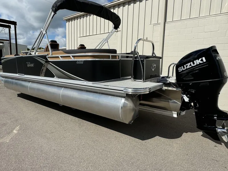 Slide: The Image of 2025 Tahoe LTZ 2585 QL pontoon boat with Suzuki outboard motor. - 2