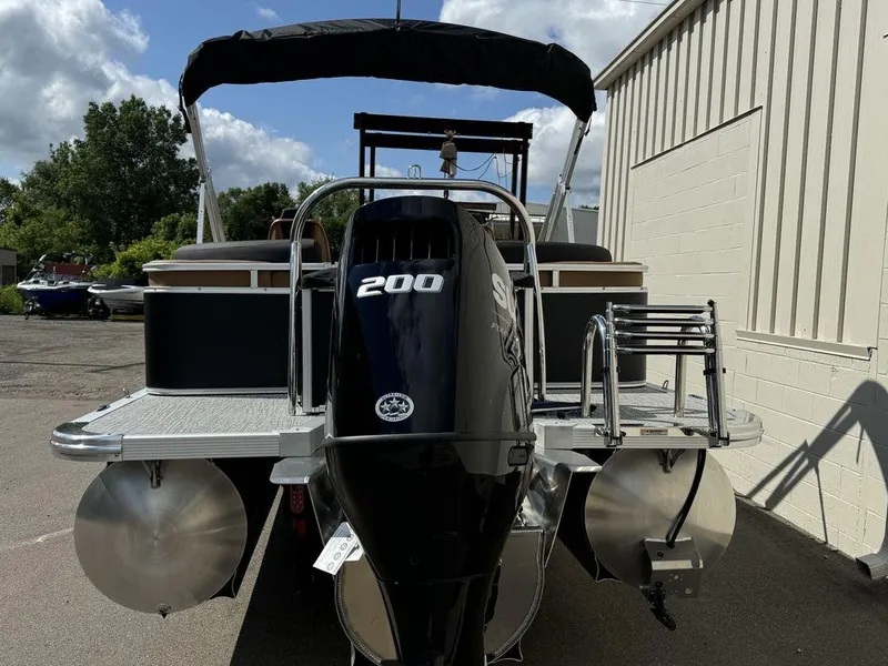 Slide: The Image of 2025 Tahoe LTZ 2585 QL pontoon boat with 200 HP engine, rear view. - 4