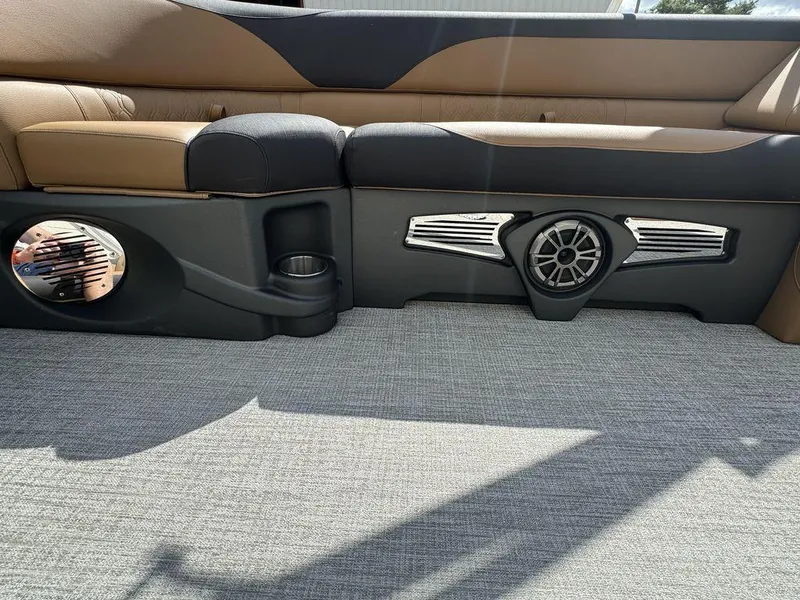 Slide: The Image of 2025 Tahoe LTZ 2585 QL boat interior with premium seating and built-in speakers. - 7
