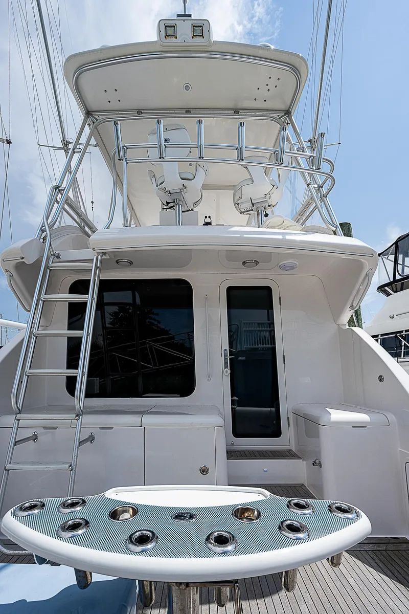 Slide: The Image of 2005 Bertram 450 Convertible yacht, rear view with ladder and deck features. - 19