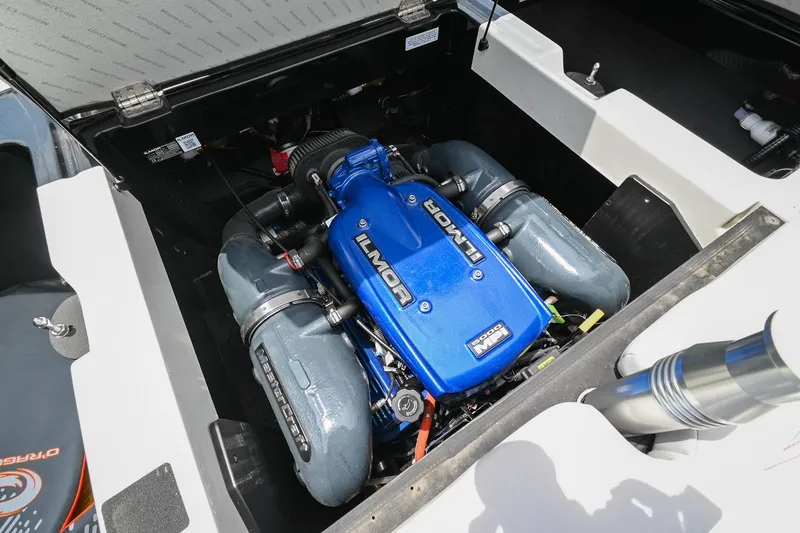 Slide: The Image of 2018 MasterCraft XT23 engine compartment with Ilmor engine, showcasing powerful performance features. - 47