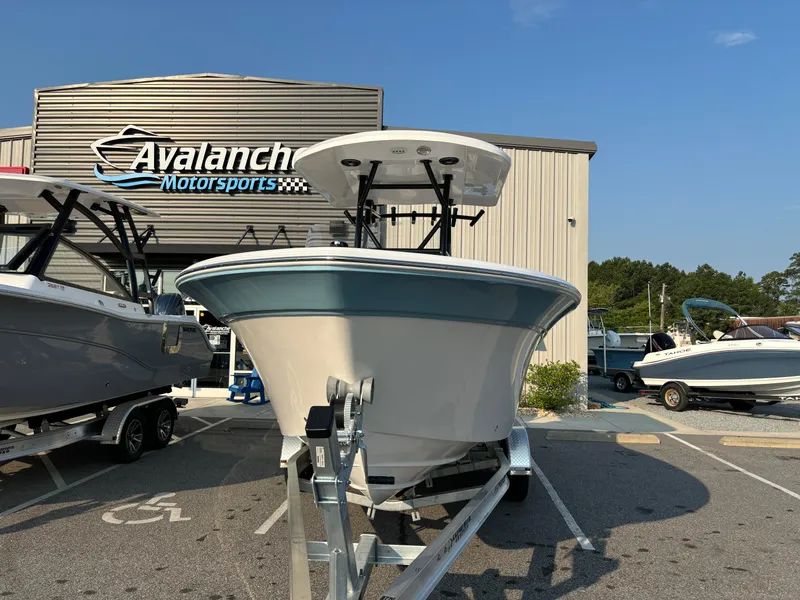 Slide: The Image of 2025 Sea Fox 248 Side Console boat at Avalanche Motorsports dealership. - 3