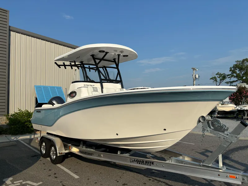 Slide: The Image of 2025 Sea Fox 248 Side Console boat on trailer, parked outdoors. - 5