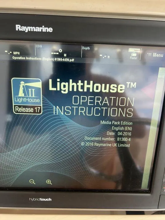 Slide: The Image of Raymarine LightHouse operation instructions on Grady-White 336 Canyon, 2012 model. - 14