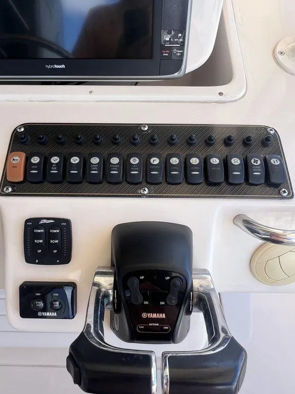 Slide: The Image of Control panel of 2012 Grady-White 336 Canyon boat with Yamaha throttle. - 16