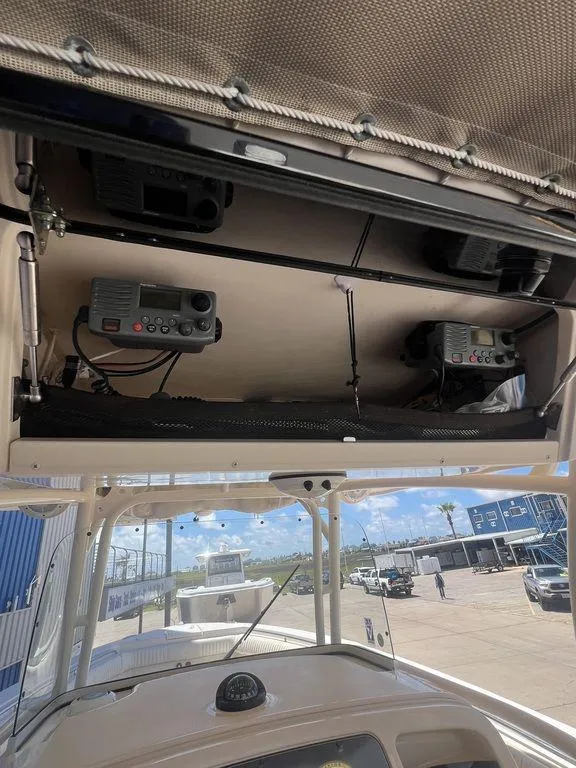 Slide: The Image of 2012 Grady-White 336 Canyon boat electronics and dashboard view. - 20