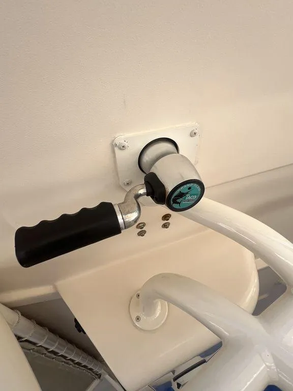 Slide: The Image of Boat steering handle on a 2012 Grady-White 336 Canyon. - 28