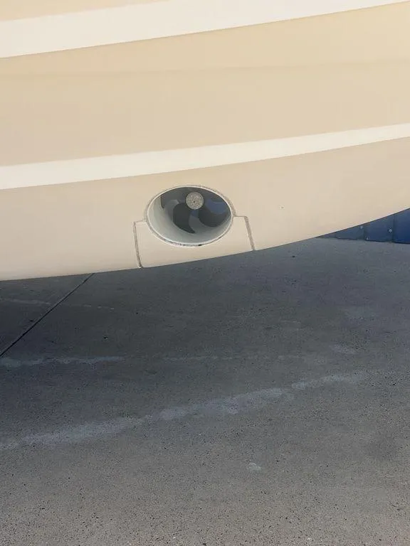 Slide: The Image of 2012 Grady-White 336 Canyon boat hull with thruster detail. - 4