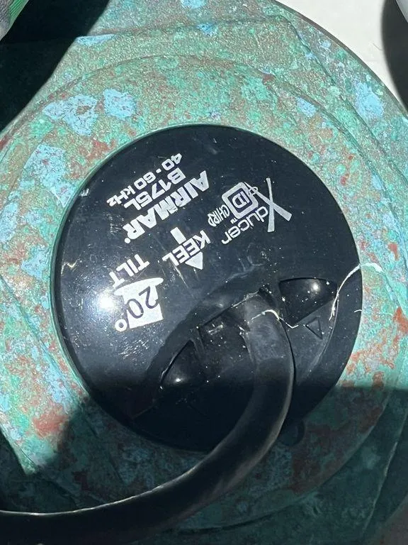 Slide: The Image of Close-up of a Yamaha 40-80LBS motor part on a 2012 Grady-White 336 Canyon boat. - 46