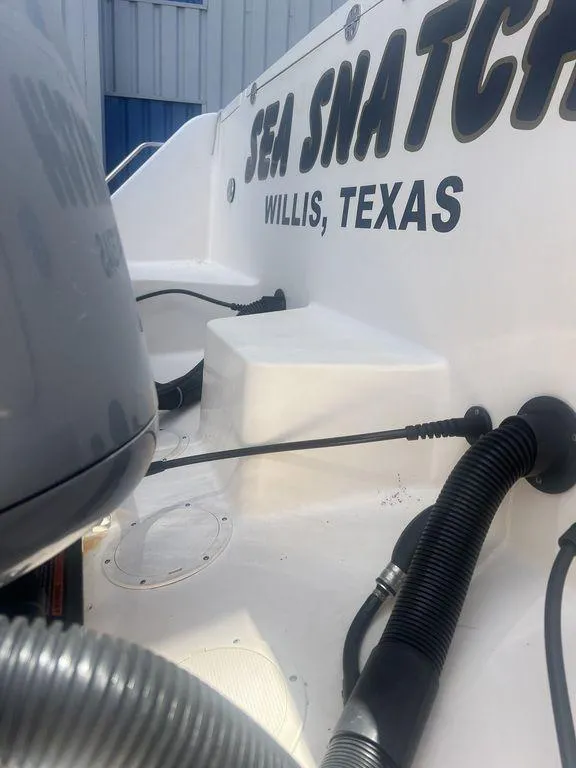 Slide: The Image of 2012 Grady-White 336 Canyon boat, "Sea Snatch," Willis, Texas, with visible engine and cables. - 9
