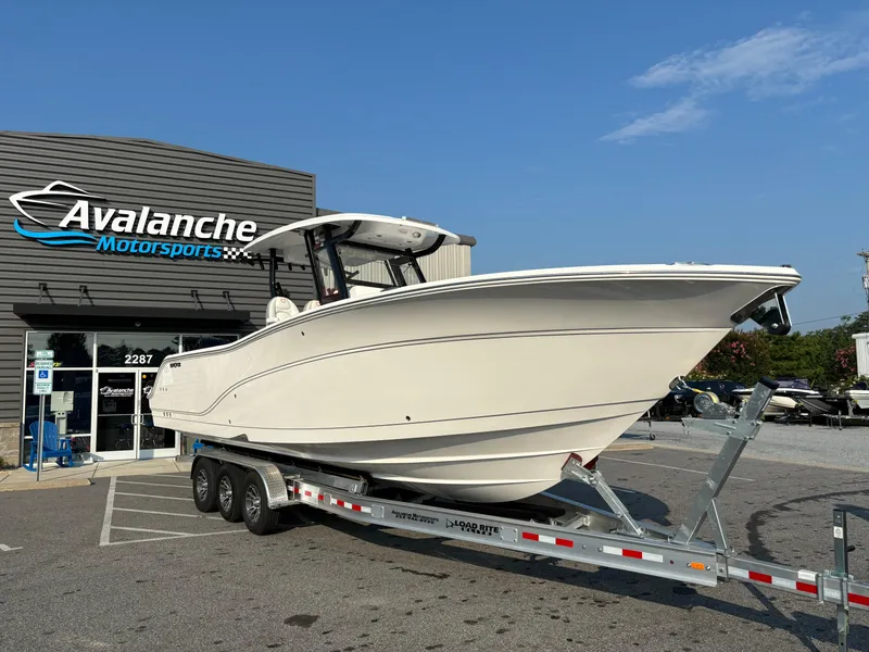 Slide: The Image of 2025 Sea Fox 328 Commander boat on trailer at Avalanche Motorsports dealership. - 23