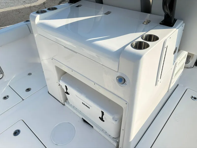 Slide: The Image of 2025 Sea Fox 328 Commander boat interior with storage and cup holders. - 7