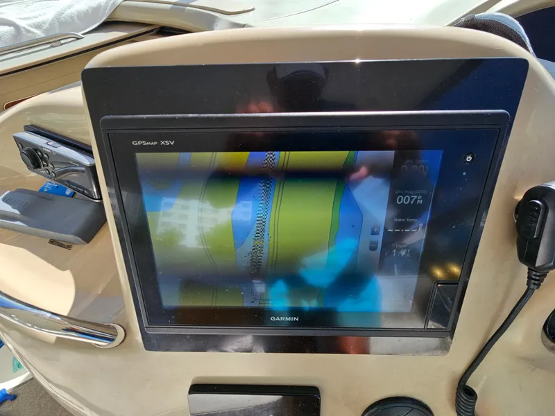 Slide: The Image of Garmin GPS display on 2002 Sea Ray 460 Sundancer boat dashboard. - 15