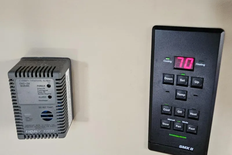 Slide: The Image of Digital thermostat and alarm system on a 2002 Sea Ray 460 Sundancer yacht. - 30