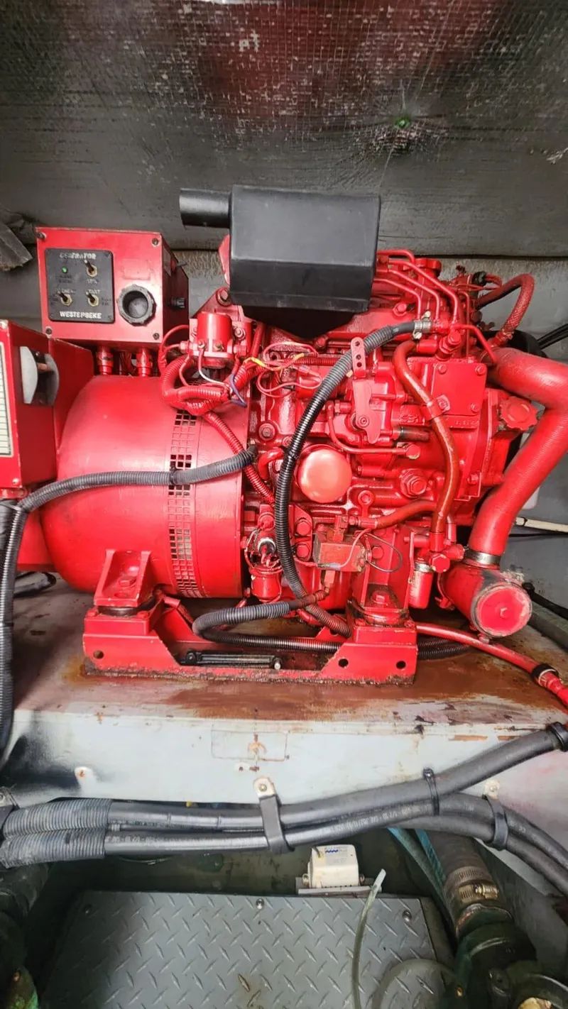 Slide: The Image of Red engine of a 2002 Sea Ray 460 Sundancer boat. - 33