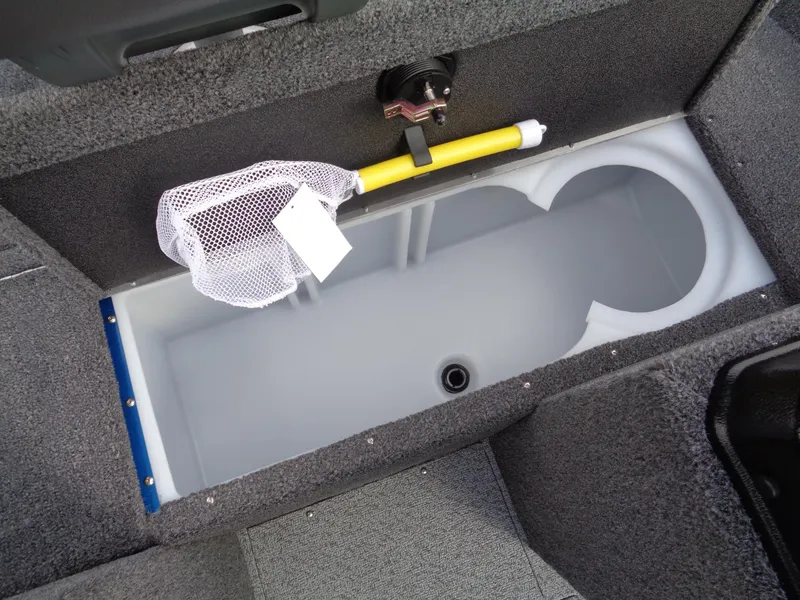 Slide: The Image of 2024 Lund 1650 Rebel XL Sport livewell with net and yellow handle. - 13