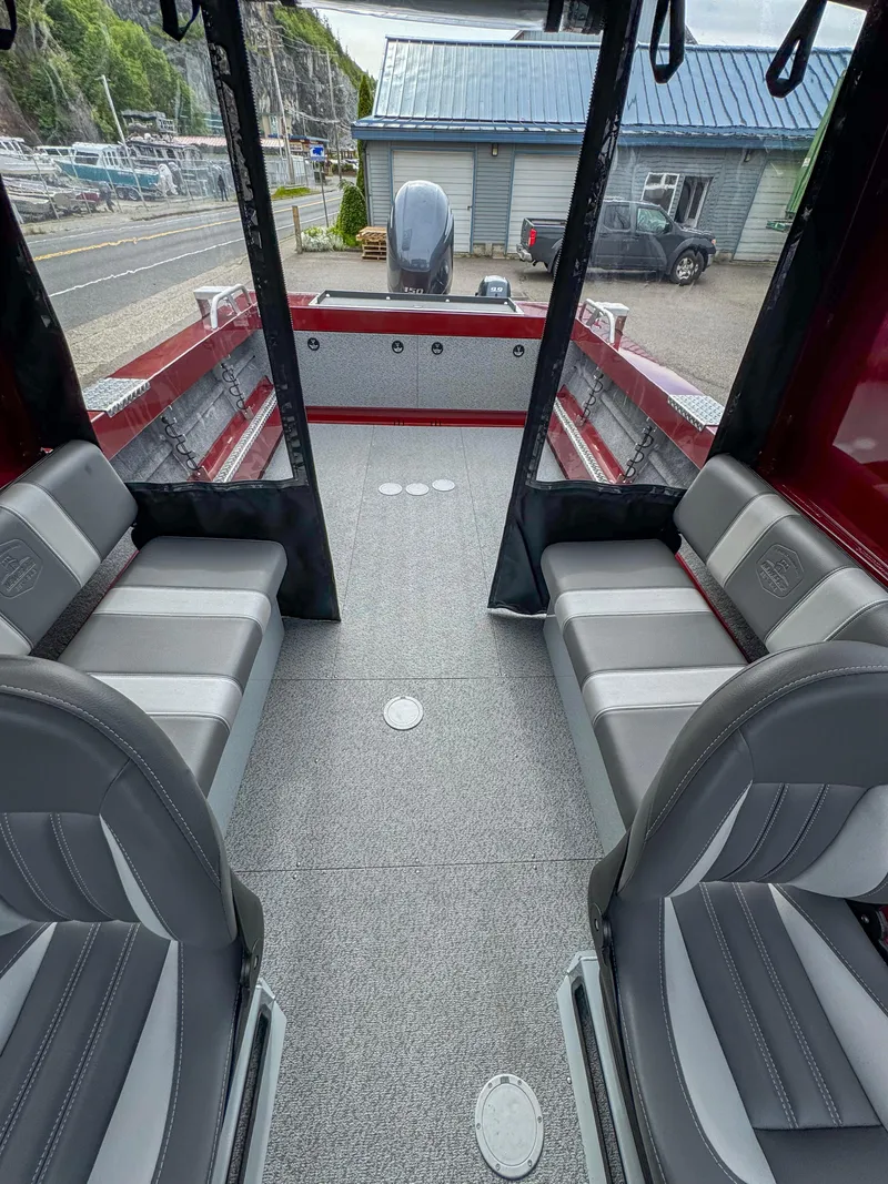 Slide: The Image of 2024 Hewescraft 200 ProV ET HT interior with gray seating and spacious layout. - 6