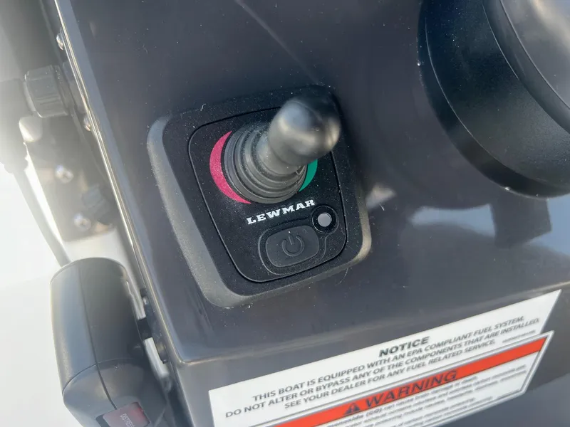 Slide: The Image of 2023 Blackfin 302 CC boat interior with white cushioned seating. - 20