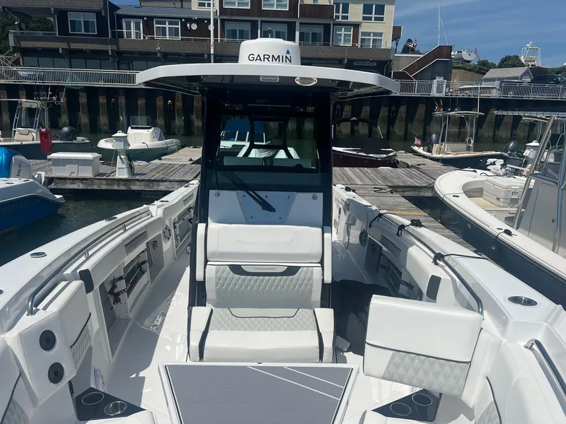 Slide: The Image of 2023 Blackfin 302 CC boat interior at marina. - 29