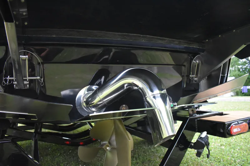 Slide: The Image of 2024 Supra SV boat stern with propeller and exhaust system. - 5