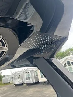 Slide: The Image of Close-up of AMP 333CC 2025 model's sleek black interior design. - 14