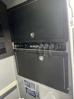 Slide: The Image of Control panel of AMP 333CC, 2025 model, featuring various knobs and secure compartments. - 17