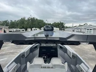 Slide: The Image of 2025 AMP 333CC boat interior with advanced navigation system. - 22