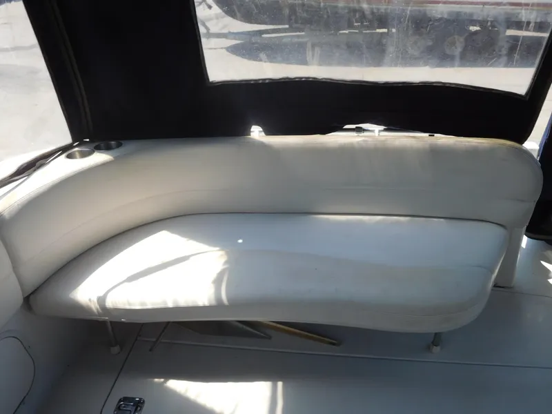 Slide: The Image of 2001 Four Winns 298 Vista boat interior with white leather seating. - 10