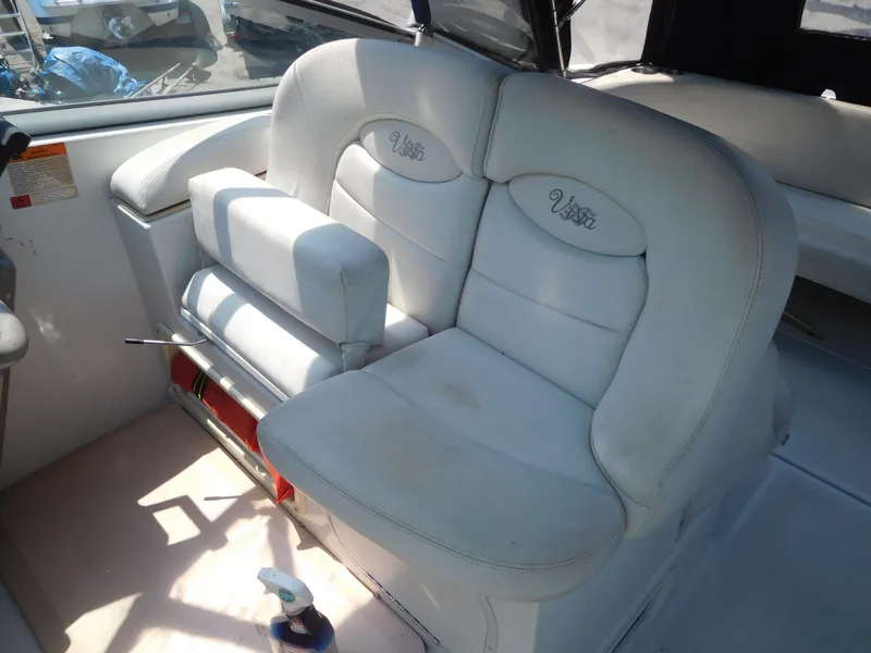 Slide: The Image of 2001 Four Winns 298 Vista boat interior seating with white upholstery. - 16