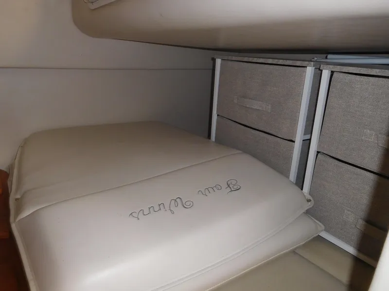 Slide: The Image of Interior storage area of a 2001 Four Winns 298 Vista boat. - 27