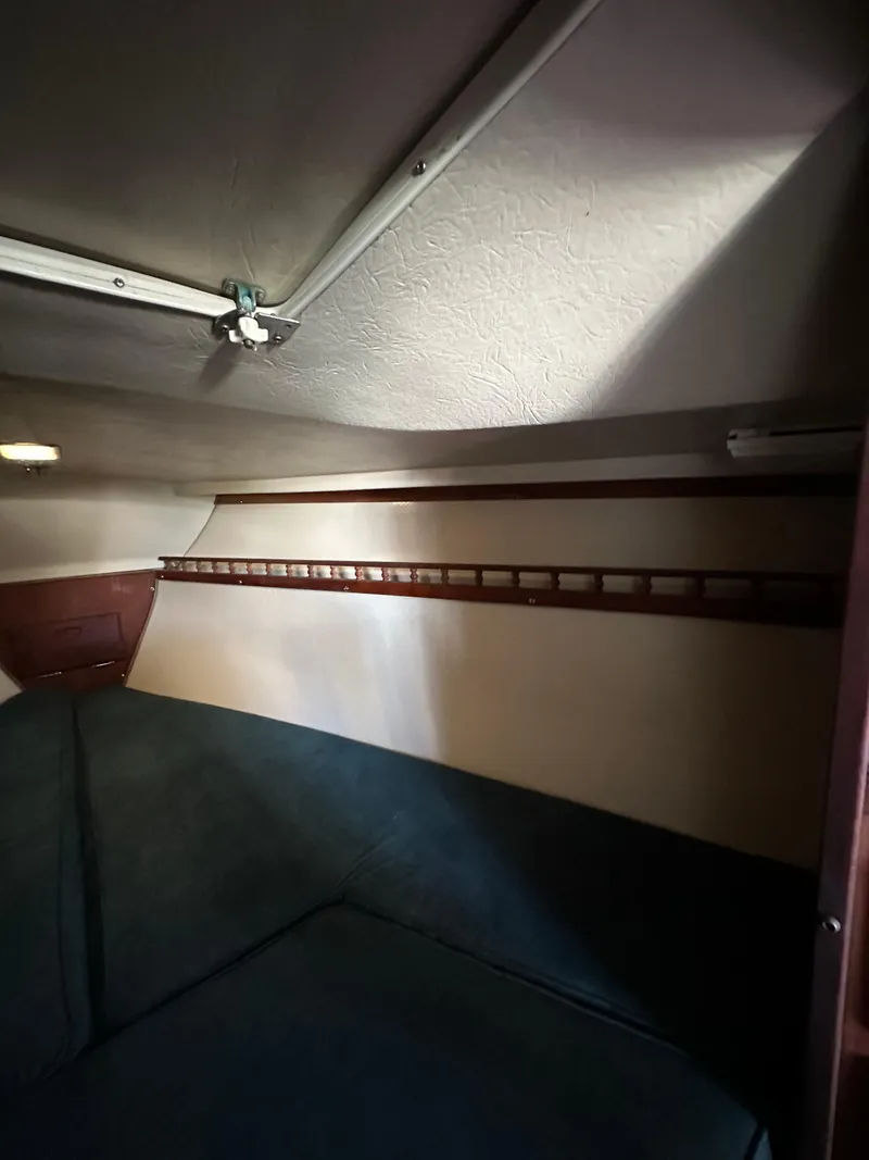 Slide: The Image of Interior cabin of 1983 Catalina 30 Tall Rig sailboat with cozy sleeping area. - 39
