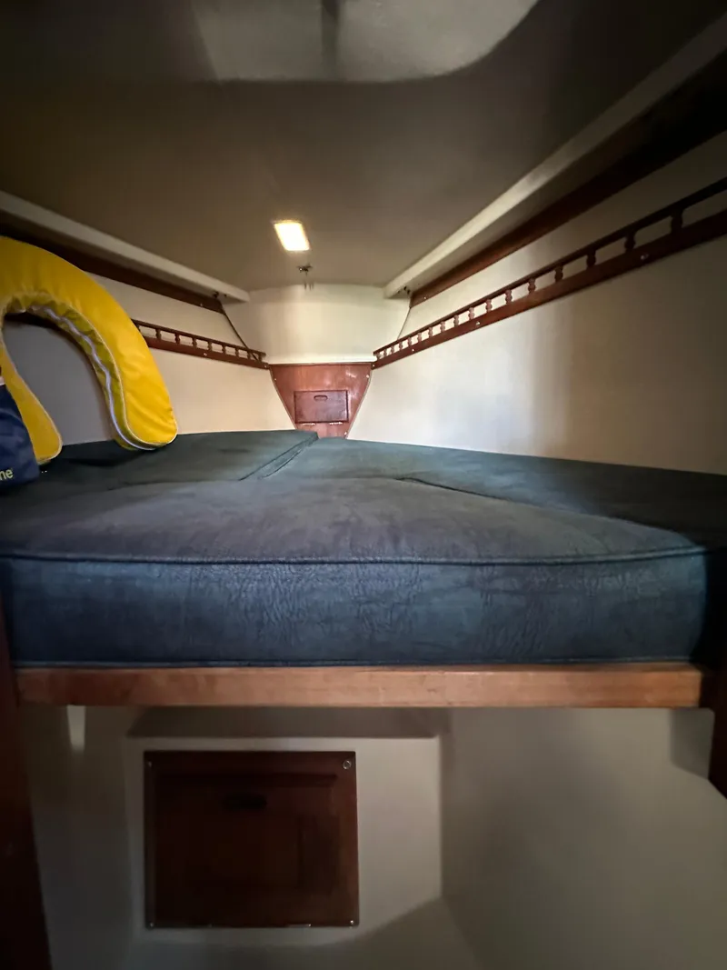 Slide: The Image of Interior cabin of 1983 Catalina 30 Tall Rig sailboat with cushioned berth. - 40