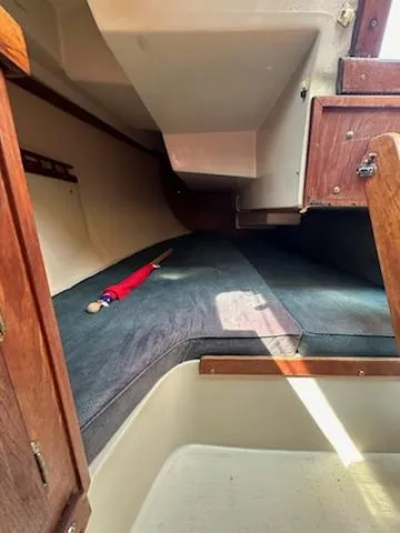 Slide: The Image of Interior cabin of 1983 Catalina 30 Tall Rig sailboat with wooden accents. - 5