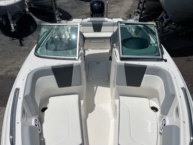 Slide: The Image of 2024 Chaparral 23 SSi OB boat interior with open bow seating. - 16