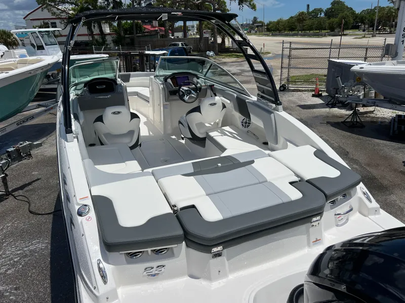 Slide: The Image of 2024 Chaparral 23 SSi OB boat with spacious seating and modern design. - 5