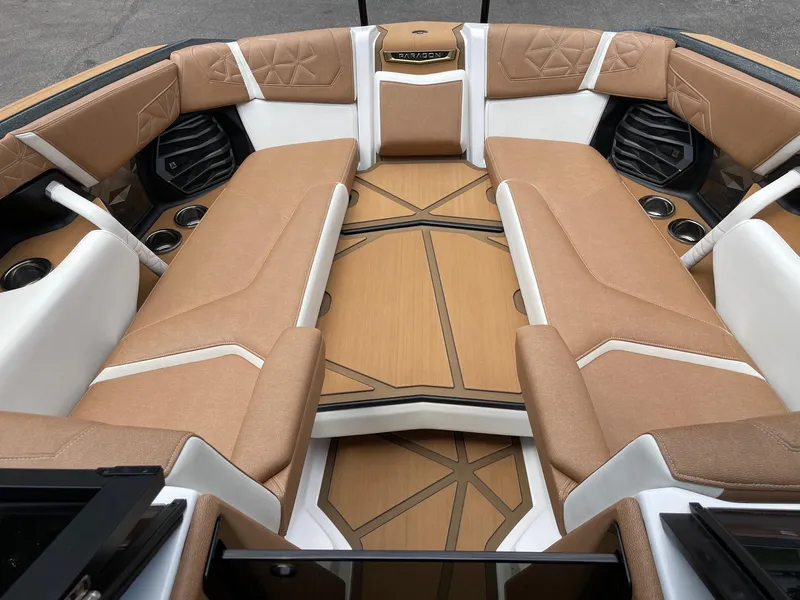 Slide: The Image of Luxurious interior of the 2024 Nautique Super Air Nautique G25 Paragon boat. - 13