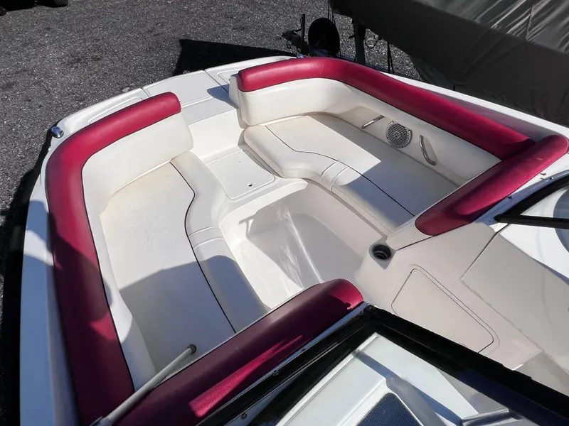 Slide: The Image of 2016 Bayliner 195 Deck Boat with red and white seating. - 20