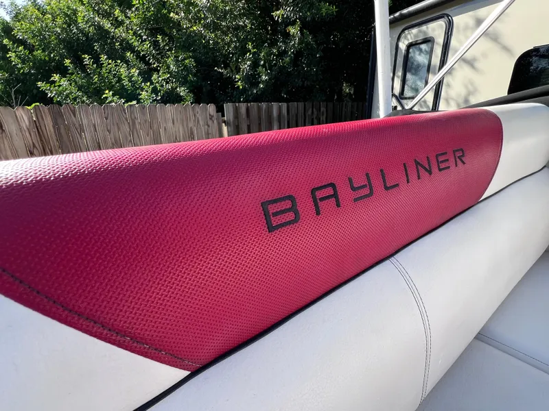Slide: The Image of 2016 Bayliner 195 Deck Boat red and white interior detail. - 25