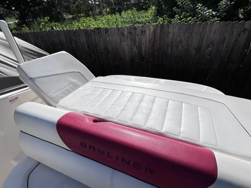 Slide: The Image of 2016 Bayliner 195 Deck Boat with white and red seating. - 28