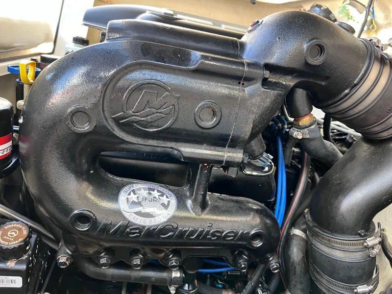 Slide: The Image of 2016 Bayliner 195 Deck Boat MerCruiser engine close-up. - 31