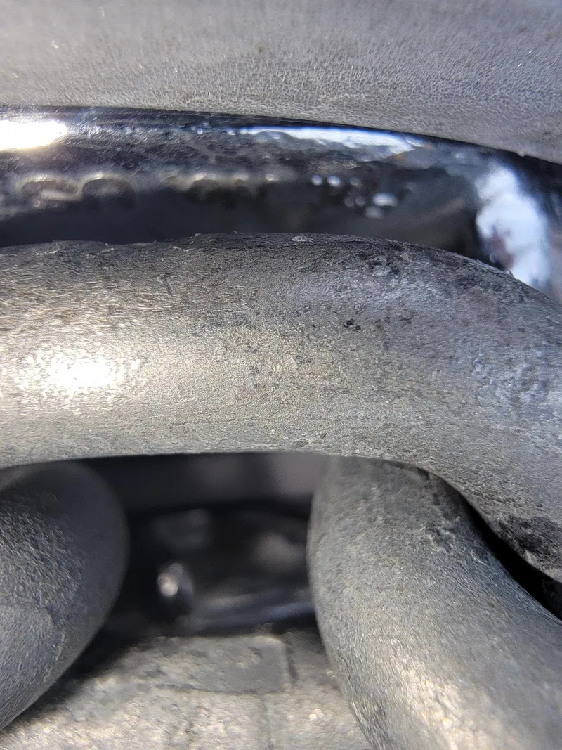 Slide: The Image of Close-up of engine components on a 1996 Sea Ray 370 Sedan Bridge. - 47