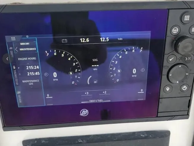 Slide: The Image of Dashboard of a 2022 Invincible 33 Catamaran showing engine hours and RPM. - 9